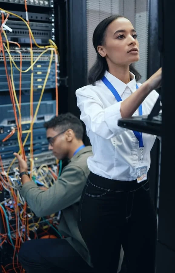 cropped shot of two young computer programmers jpg