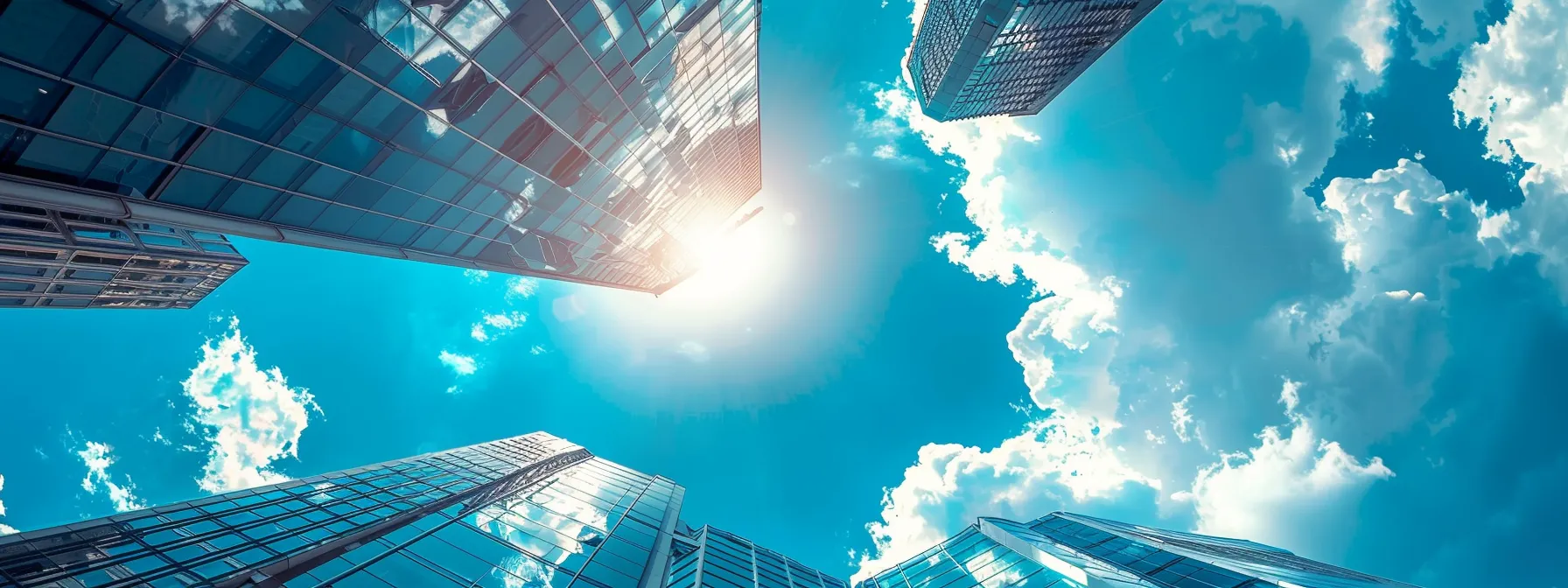 an expansive sky filled with billowing clouds casting shadows over a modern city skyline, symbolizing the emergence of modern cloud services in the tech industry.