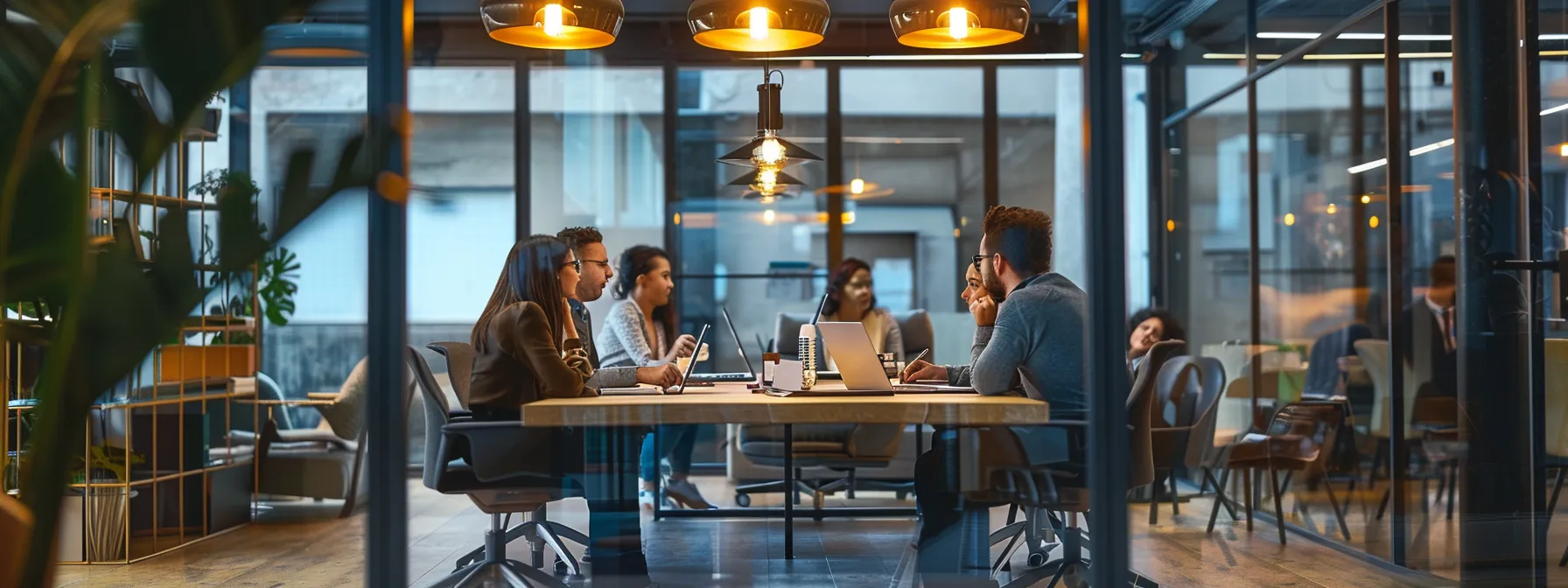 A Guide to What Is a Backpropagation Algorithm in ML 10 a modern office space buzzes with energy as a diverse team collaborates around a sleek conference table, illuminated by sharp overhead lighting, reflecting a dynamic and innovative work environment.